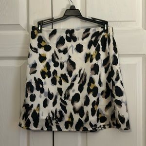 Satin white cheetah print skirt, with stretchy waste band.